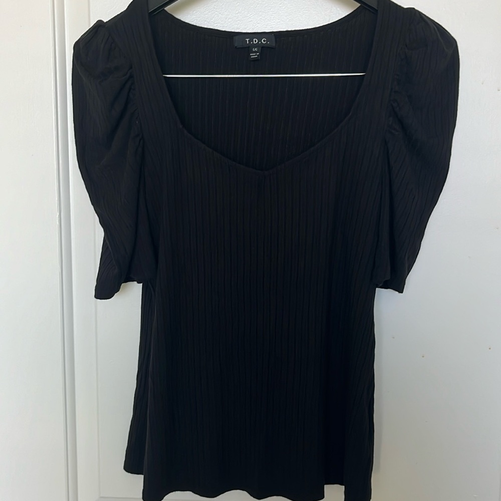 Used women’s top, size L